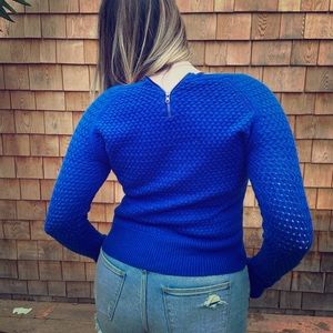 Royal blue knit sweater.
